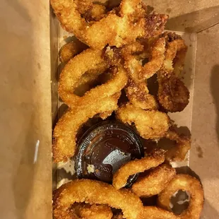 Cold burnt black on some and obviously reheated in the fryer