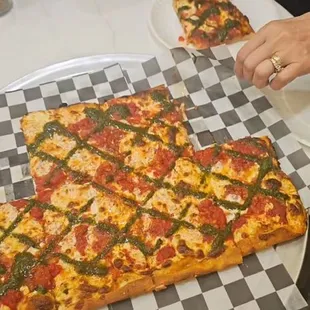 Gramma pizza ,all my friends (7of them) enjoyed the taste of the pesto ,the crust,cheese, fresh tomato sauce