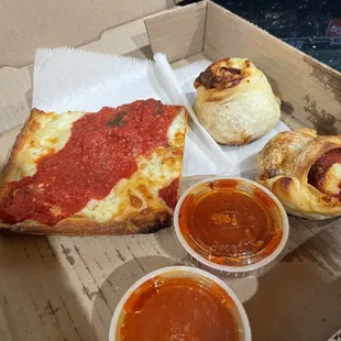 Pepperoni pinwheels and Nona slice of pizza