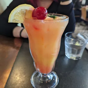 Brooklyn Street Sunrise - orange juice with a splash of grenadine, topped with maraschino cherries.