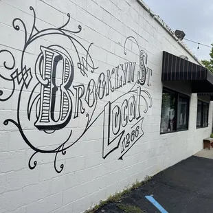 The cool art design on the outside of the building