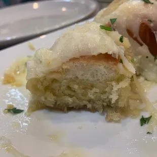 Garlic knots with cheese! Look at how much butter has been soaked up!