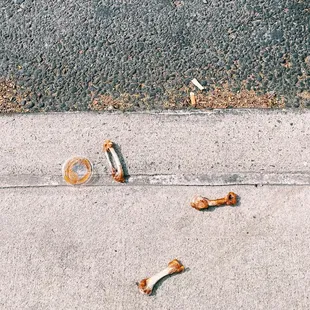 Wings littering the street