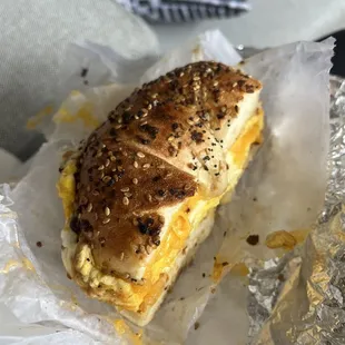 Everything bagel with scrambled egg and cheddar cheese