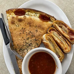 Stuffed pizza and Pepperoni Pinwheels with marinara sauce