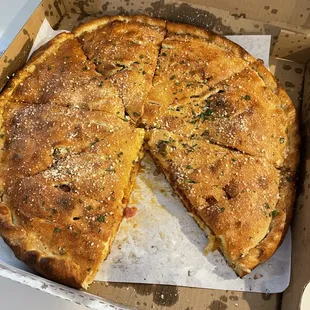Inside pizza box: Stuffed Meat Lovers Pizza.