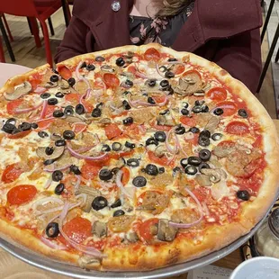 This is the New York pizza without green peppers