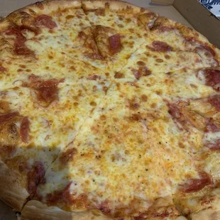 Pepperoni pizza, with barely any pepperoni.