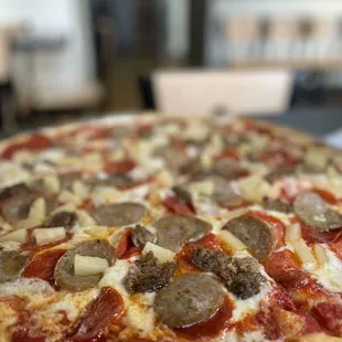 pepperoni, sausage, and cheese pizza