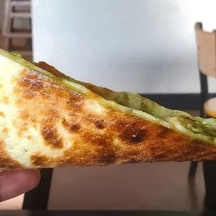 Pesto slice, side profile ($3.50)