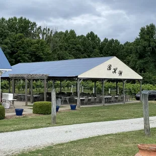Outdoor seating with ceiling fans.