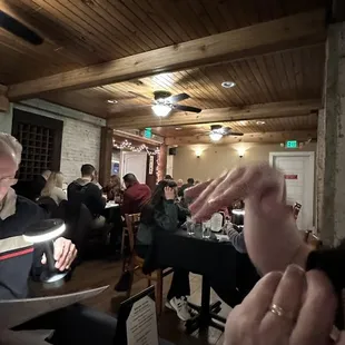 a group of people sitting at a table