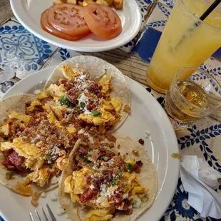 03/05/23 Chorizo Tacos, sliced tomatoes and home fries
