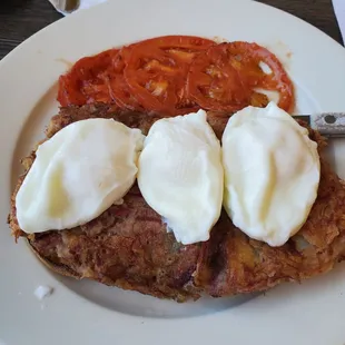 Eggs bendict over their homemade cornedbeef