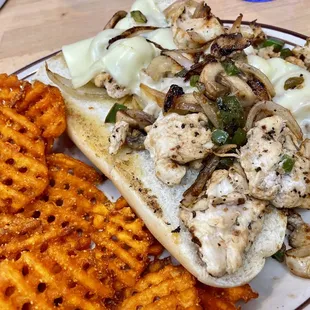 Philly Cheesesteak Sandwich (but with chicken) and Sweet Potato Fries
