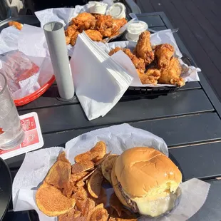 Jalepeno burger, house made chips, and wings!