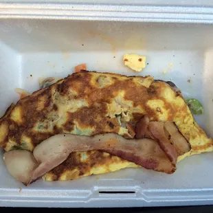Ordered a veggie omelet with bacon, my bacon was completely raw. The manager had no reaction to my complaint... He didn't even apologize.