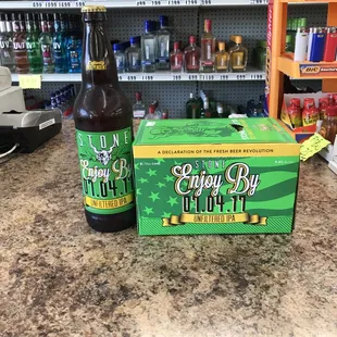 a bottle and a box of beer