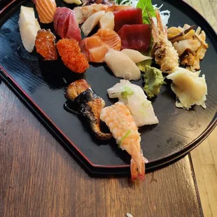 Sushi and sashimi platter ( also comes with miso soup and a house salad )