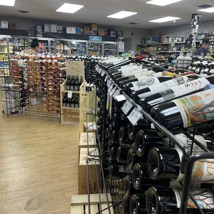 rows of wine bottles in a store