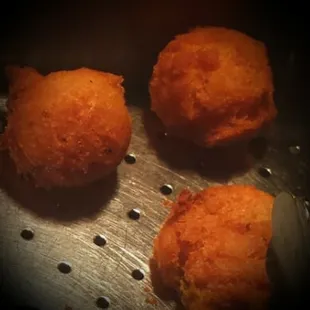 Hush puppies!  Cooked just right IMO.