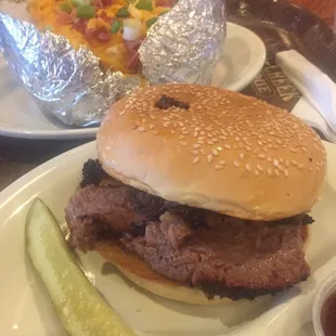 Brisket sandwich and baked potato