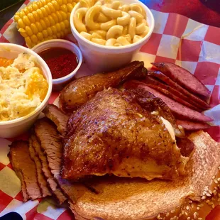 3 Meat Plate: Brisket, Chicken, Jalapeño Sausage. Comes w/ 2 sides (mac, potato casserole) &amp; corn on the cob