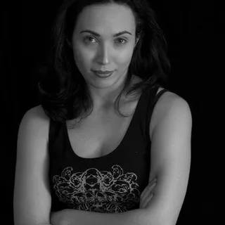 Janelle M.
