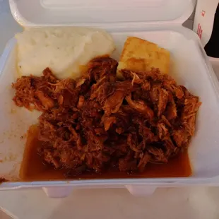 Chicken BBQ meal with mashed potato and cornbread. Salad not pictured. Total bill $17.62 with drink.
