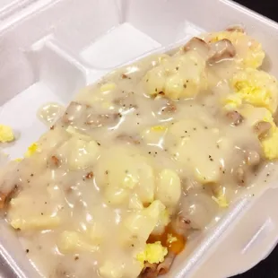 Biscuits and gravy with ham and scrambled eggs