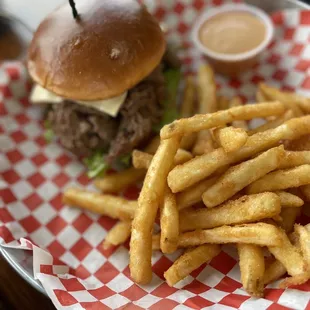 a plate of fries and a hamburger