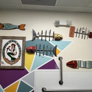 Restroom - the fish made with cutlery skeleton are pretty cool!