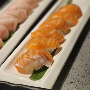two rectangular plates of sushi