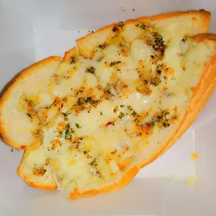 This cheesy garlic bread is seasoned nicely with a perfect blend of spices, and has a true Italian gourmet flavor.