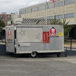 a truck parked in front of a building