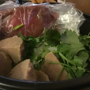 Raw steak n a bag found in beef noodle bowl