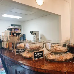 a counter with a variety of pastries