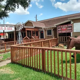 e shows a horse in a fenced in area