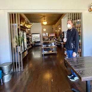 Chic upscale deli has replaced the former sit-down dining area. (Husband for scale.)