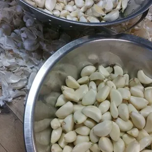 Peeling fresh garlic for all 3 salsas.