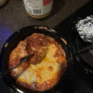 This is the most horrid lasagna. It is actually just meat sauce spread on noodles and covered in a mountain of cheese.
