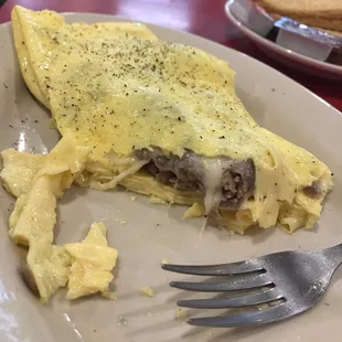 Steak &amp; cheese omelet.  No peppers or onions.  Wheat toast