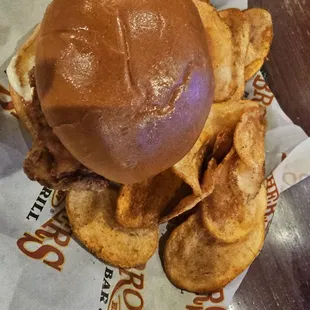 Chicken sandwich with house chips.