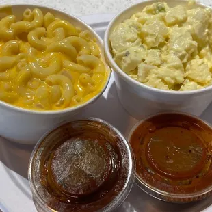 three bowls of macaroni and cheese and sauce