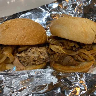 a pulled pork sandwich with onions