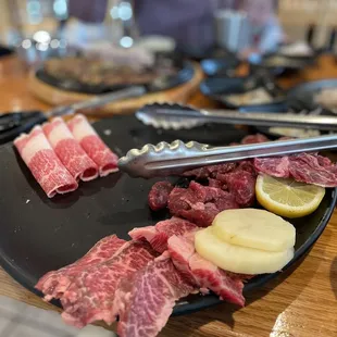 Meat platter (partially eaten)