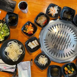 Large variety of tasty banchan, side salad