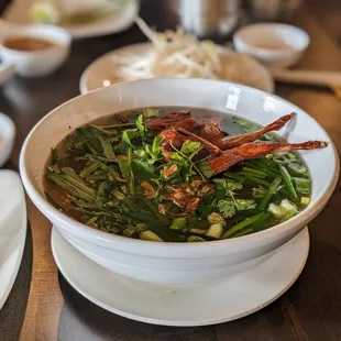 Egg noodles with grilled quail