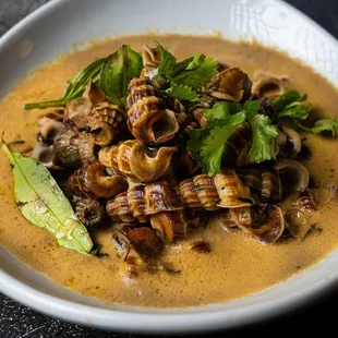 9. Oc Len Xao Dua
Braised snails in coconut milk sauce