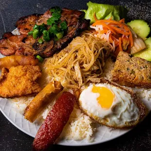 19. Com Tam Dac Biet

Special rice combo with grilled pork chop, tofu stuffed with shrimp paste, shrimp, fried egg, shredded pork, etc